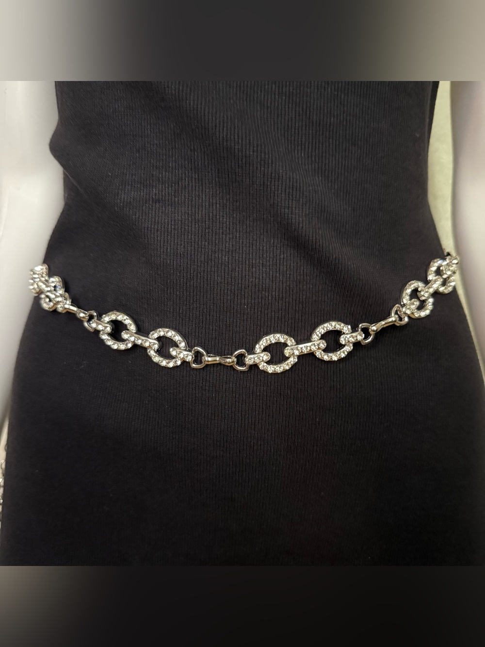 Silver tone oval links metal chain belt with rhinestone details